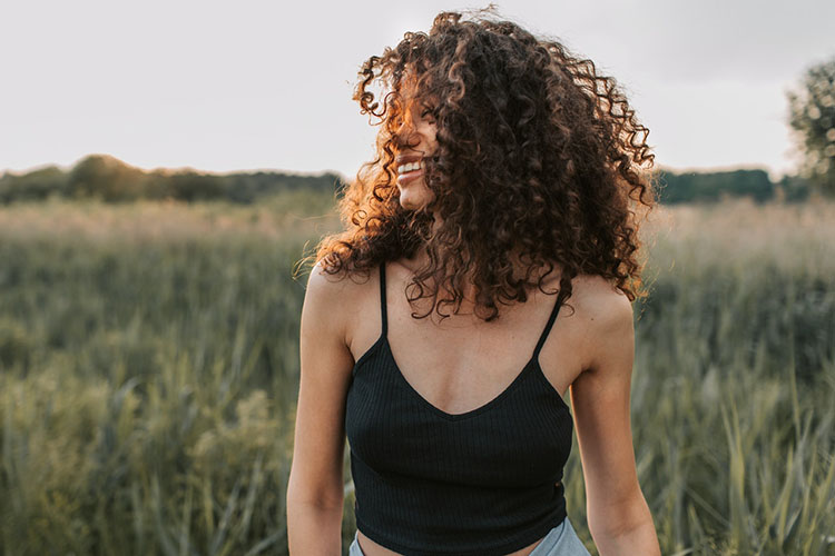 smiling woman field