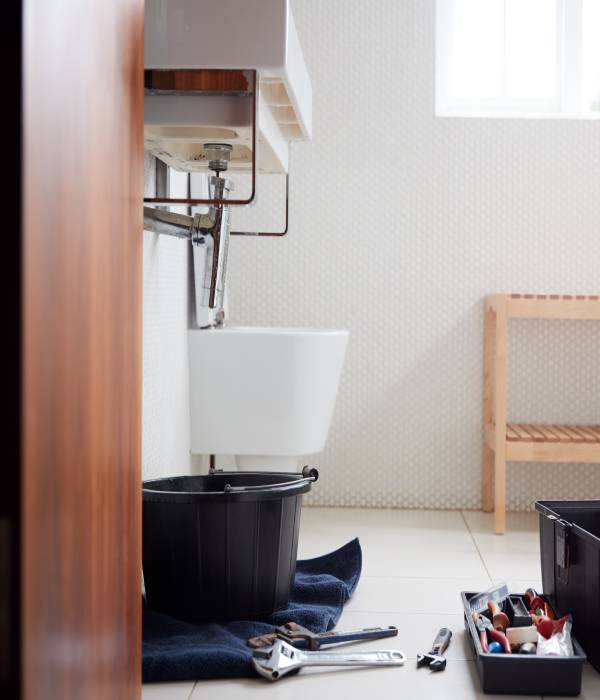 plumbing tools in bathroom ready to repair leaking QXZ6C3X min