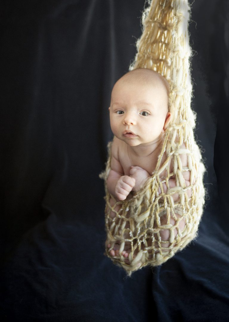 newborn hammock prop boy ten days old 768x1080